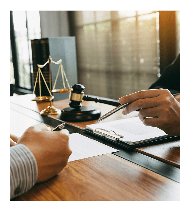 Legal consultation with gavel and scales.